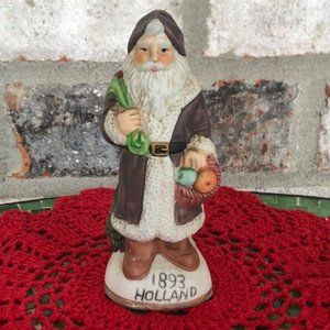 VINTAGE 1893 HOLLAND SANTA AROUND THE WORLD FIGURINE